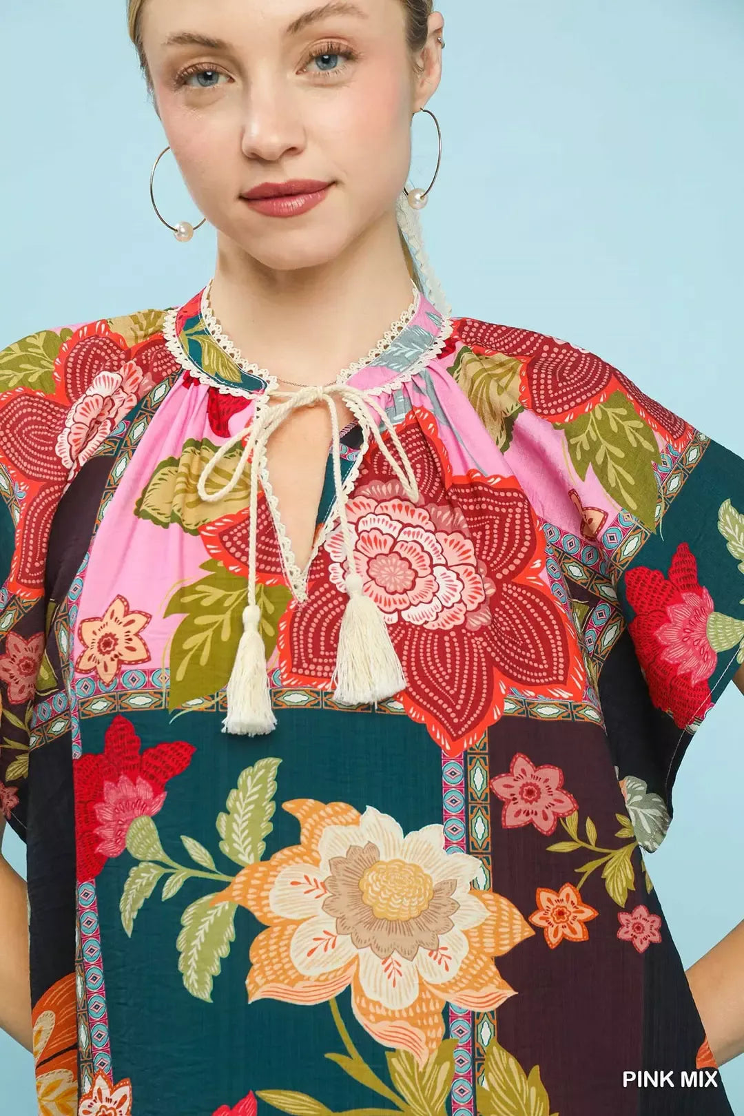 Mixed floral patchwork top with tassel tie neck