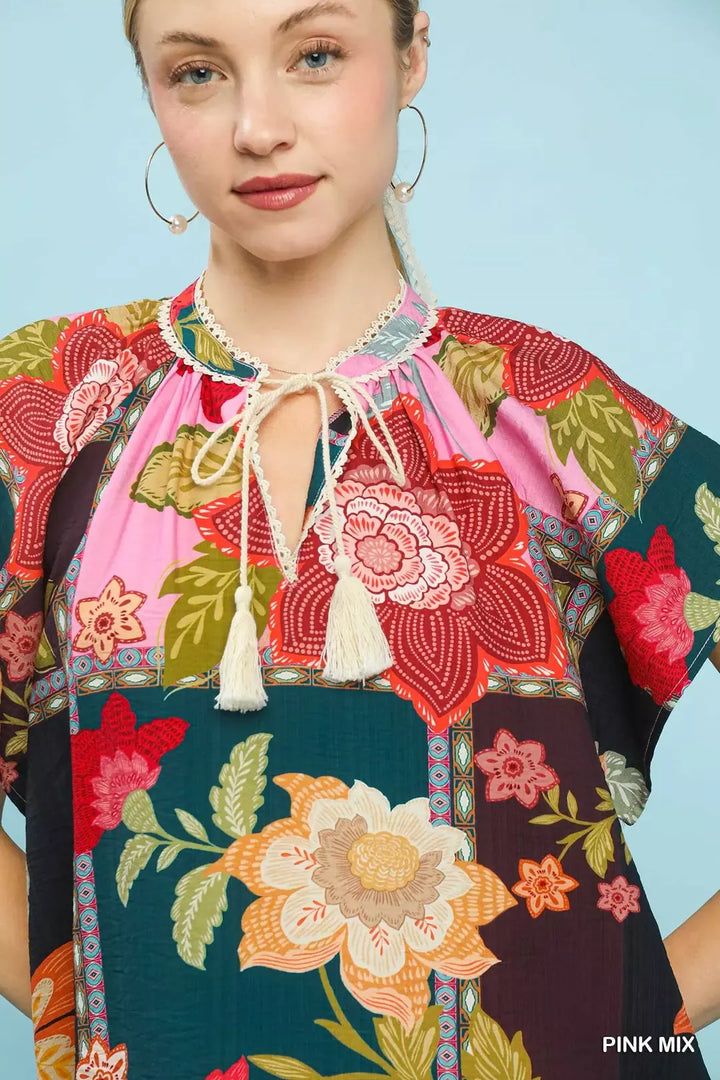 Mixed floral patchwork top with tassel tie neck