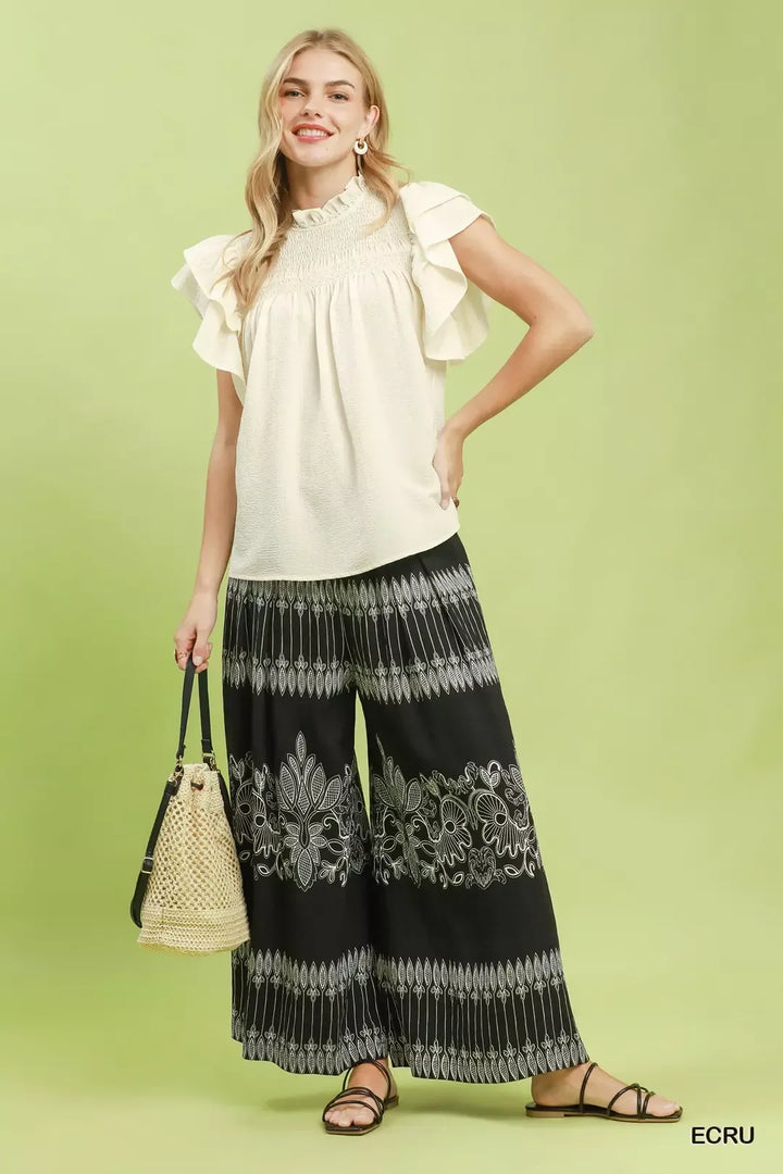 Smocked yoke ruffle flutter sleeve blouse