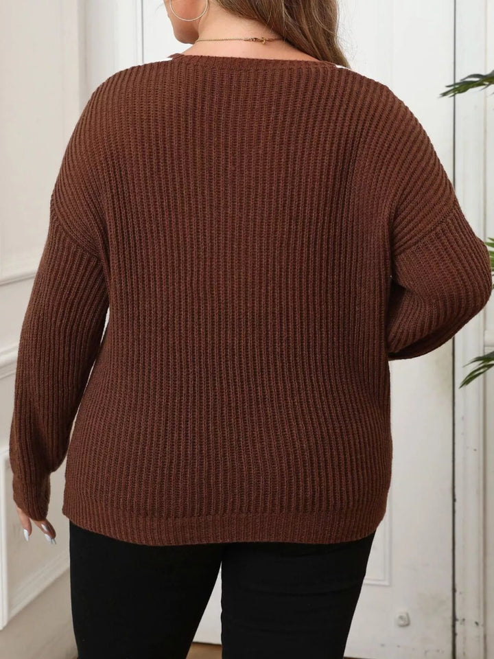 Ribbed knit V-neck sweater with contrast trim and pearl buttons