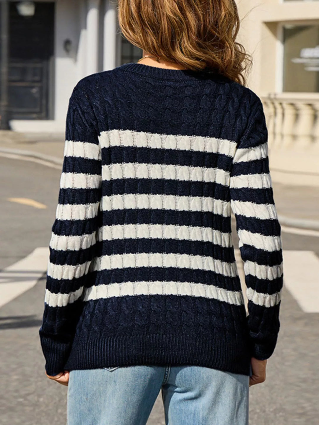 Striped cable knit sweater with ribbed crew neck