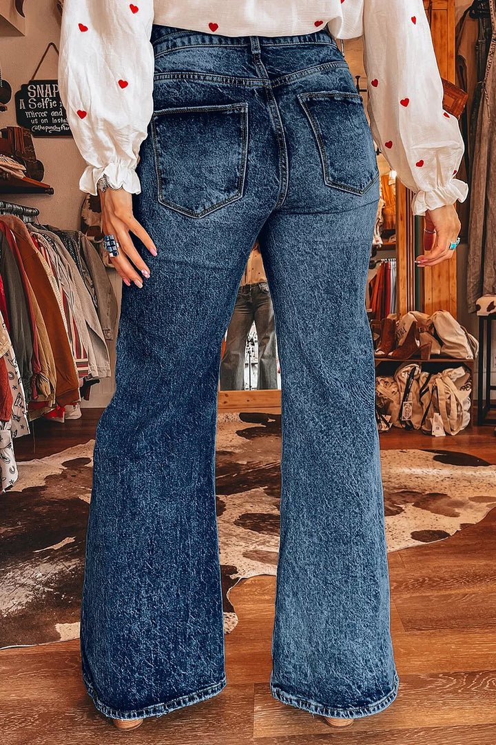Acid wash high-rise wide flare jeans with double-button waist