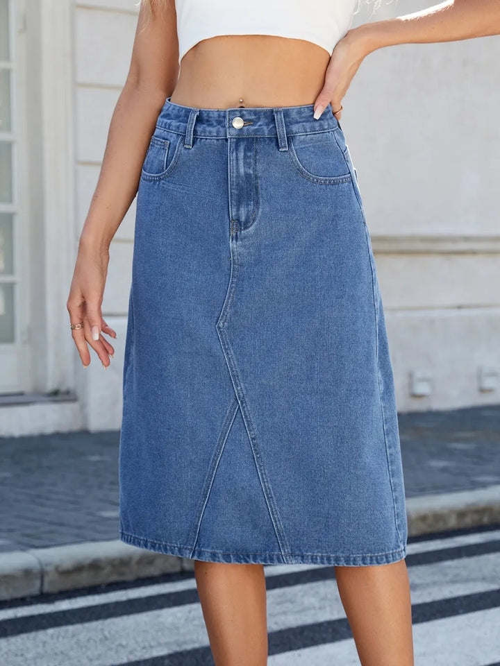 High-rise midi denim skirt with back slit and front pockets
