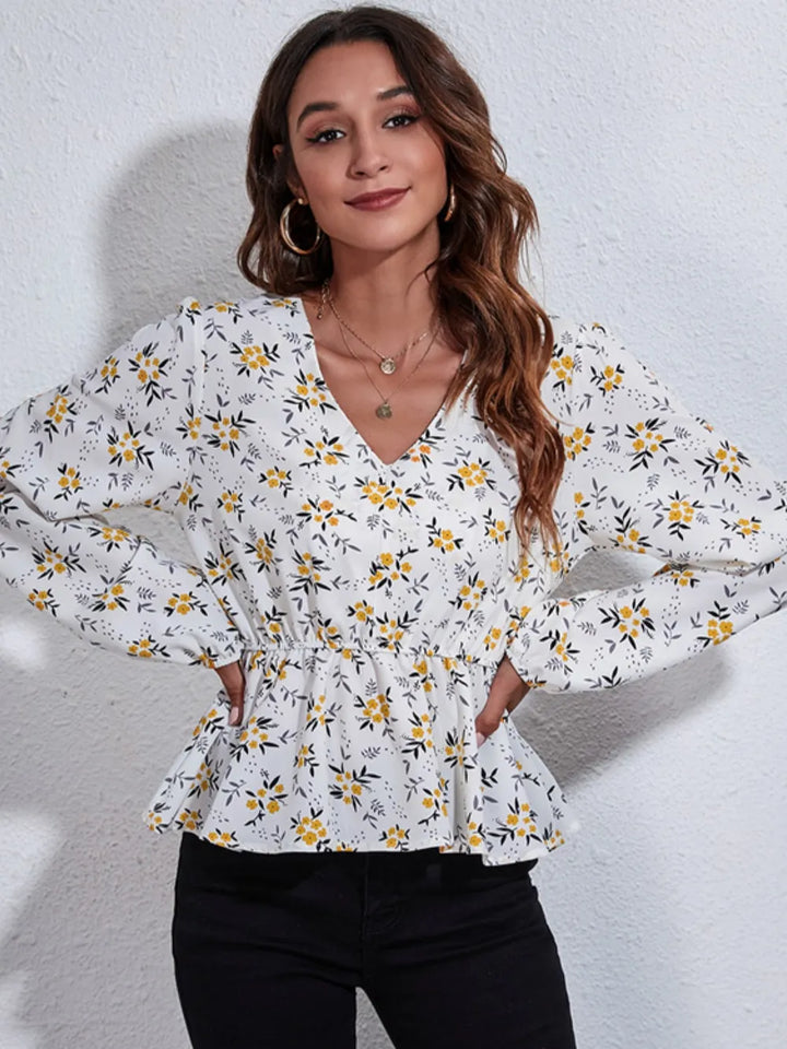 Balloon sleeve floral v-neck peplum blouse