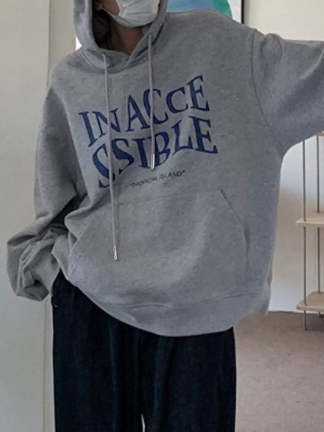 Oversized graphic pullover hoodie with kangaroo pocket