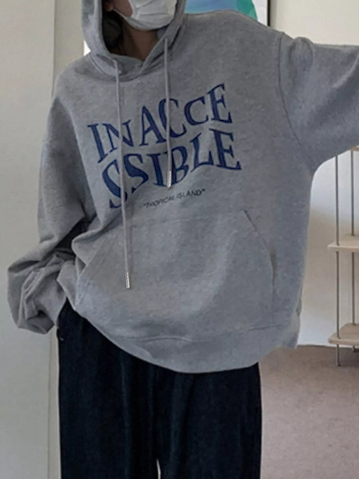 Oversized graphic pullover hoodie with kangaroo pocket