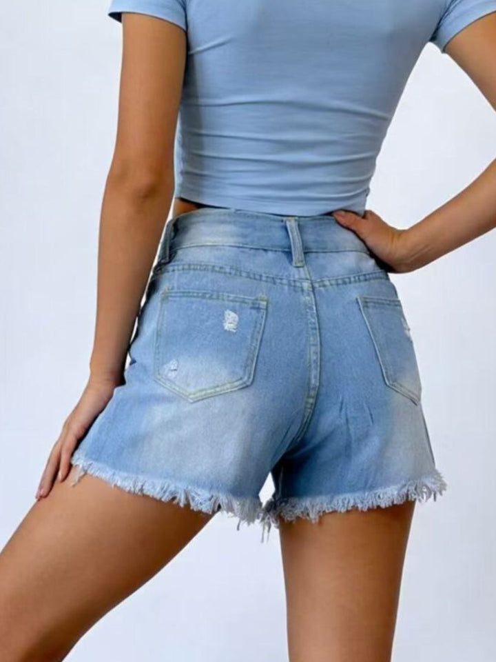 Distressed high-rise denim shorts with frayed raw hem