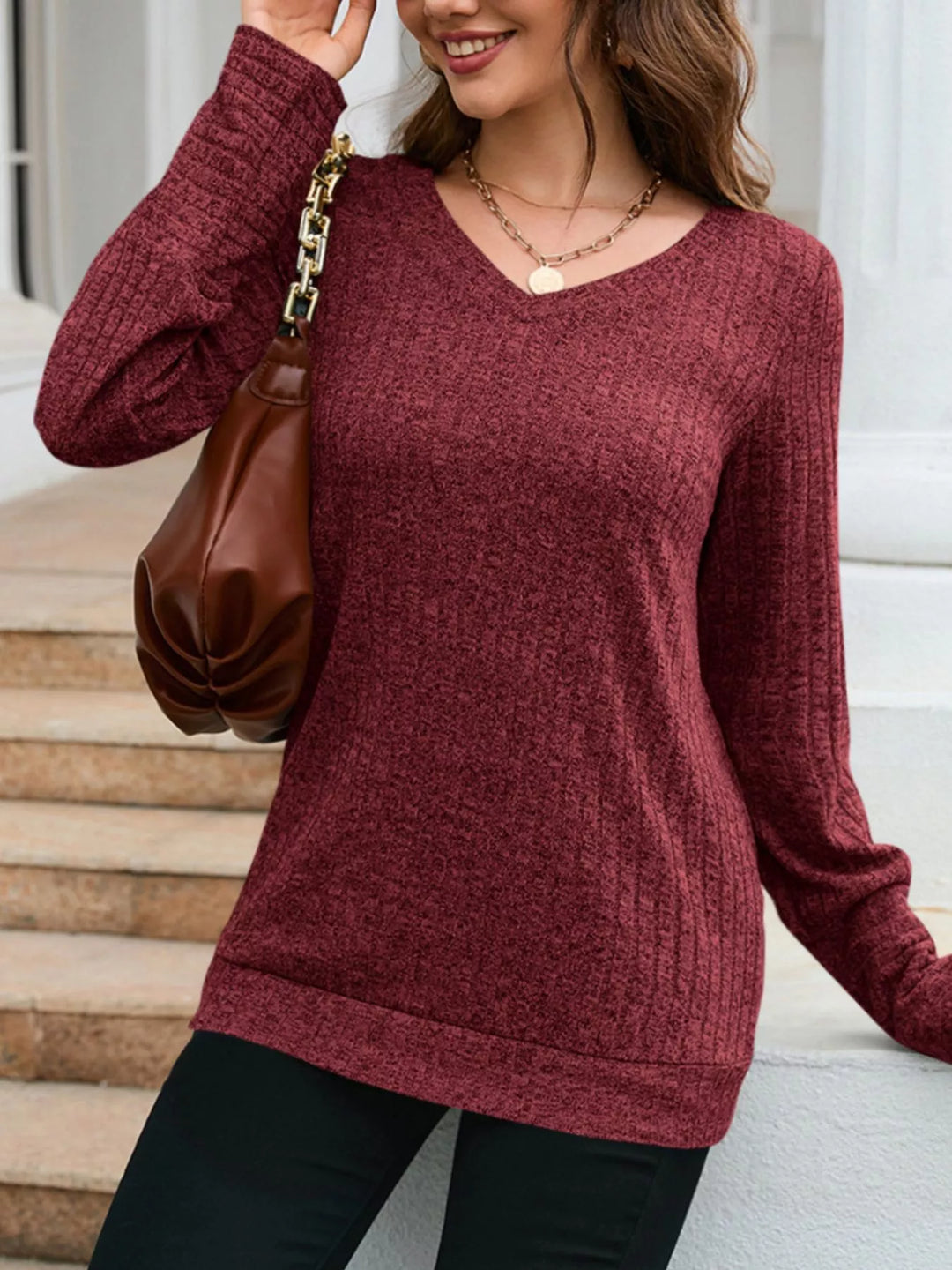 Ribbed knit V-neck long sleeve top with drop shoulders