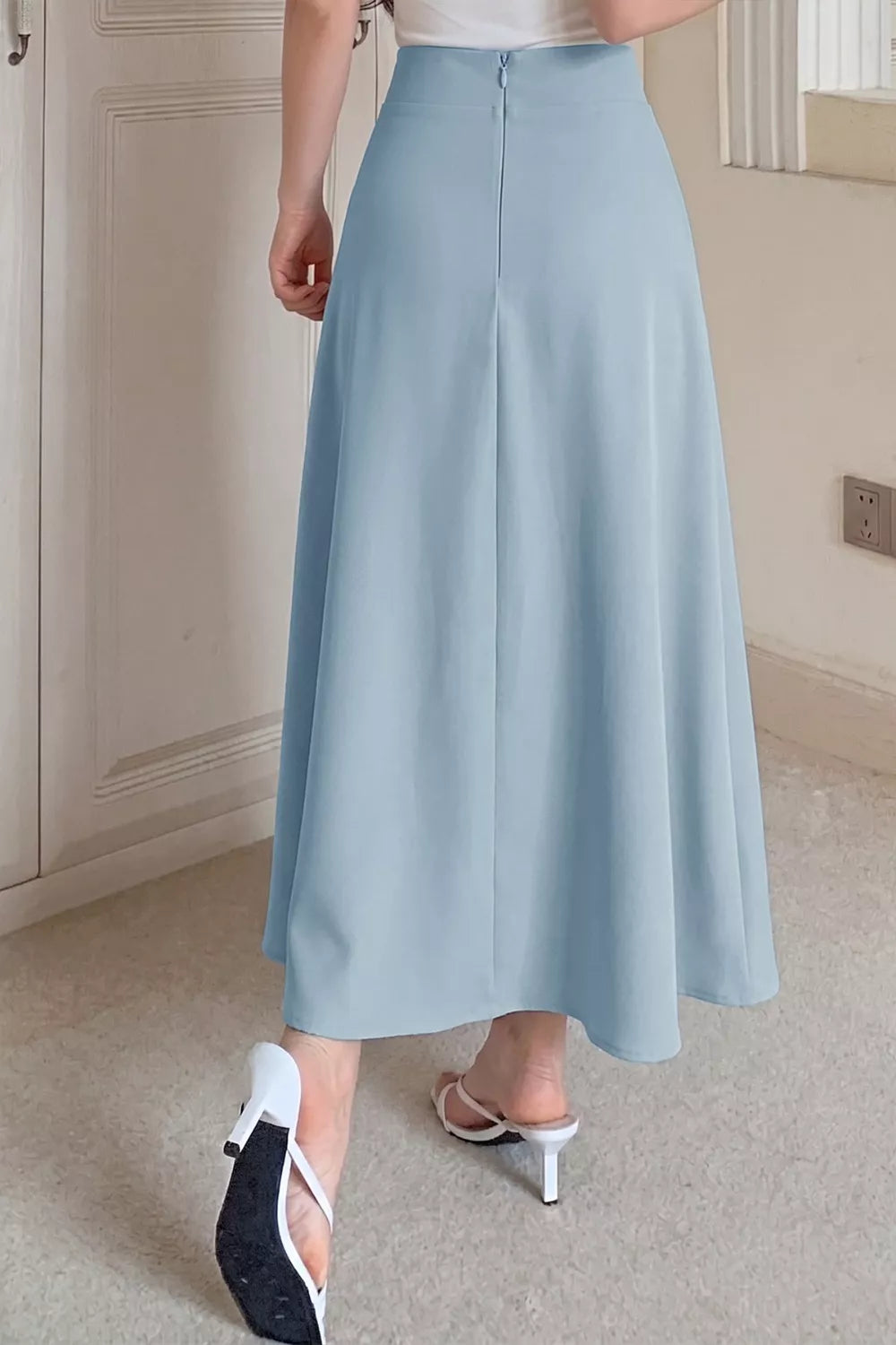 High-rise A-line midi skirt with gold button waistband
