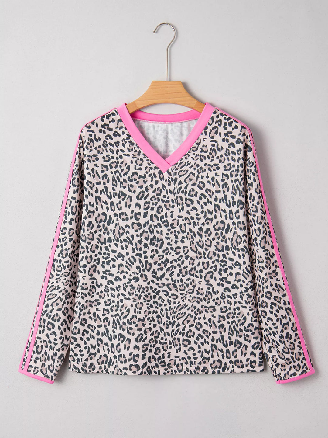 Leopard print long sleeve top with contrast V-neck trim