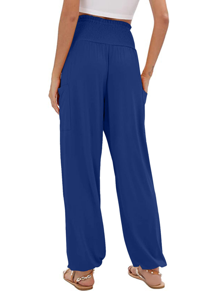 High-rise smocked harem pants with side pockets
