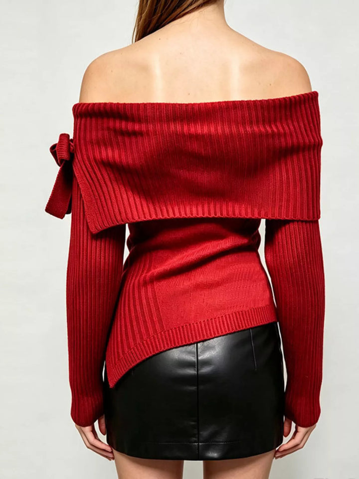 Off-shoulder ribbed knit top with bow cuff and asymmetric hem
