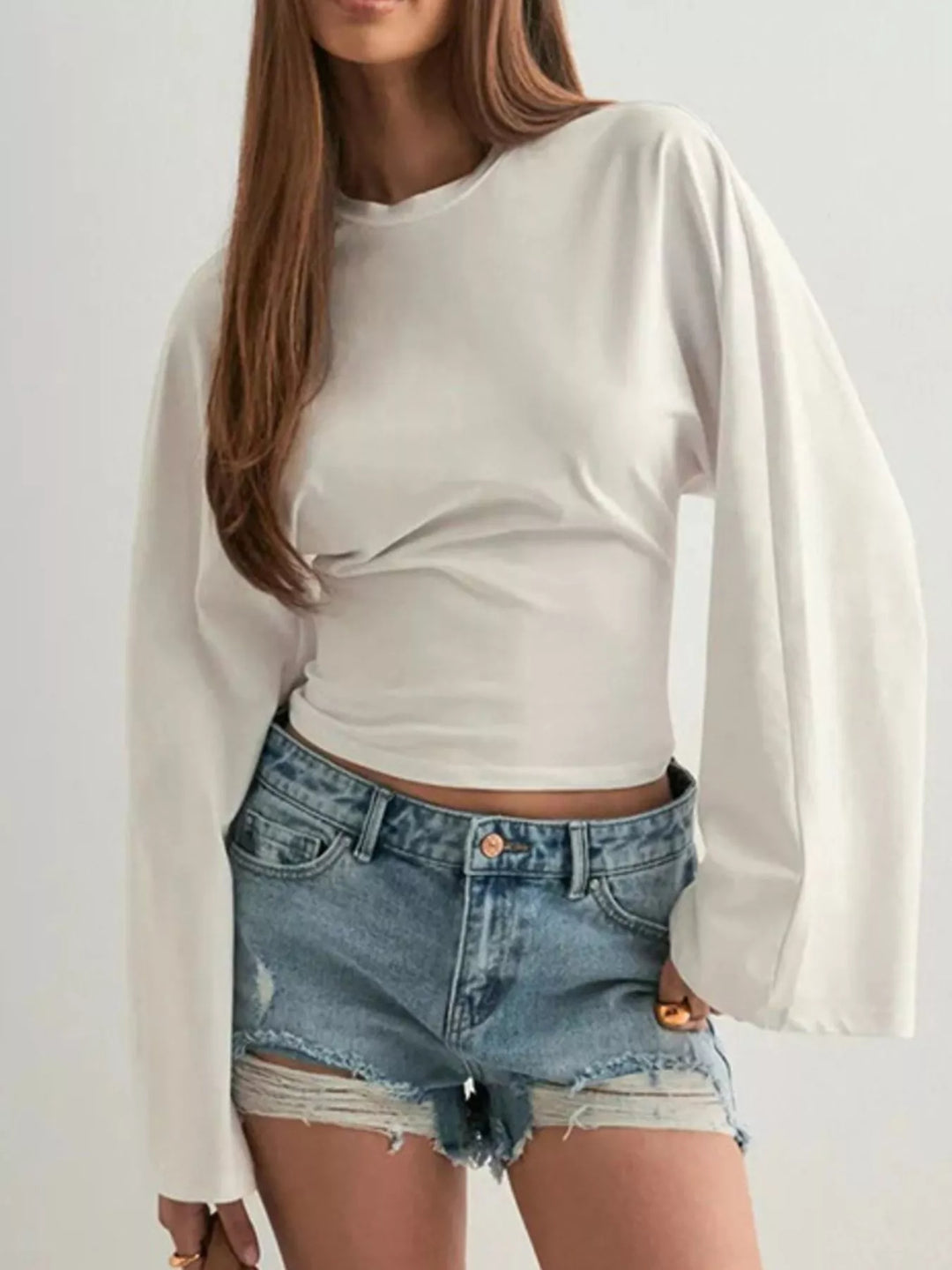 Fitted long sleeve top with flared bell sleeves