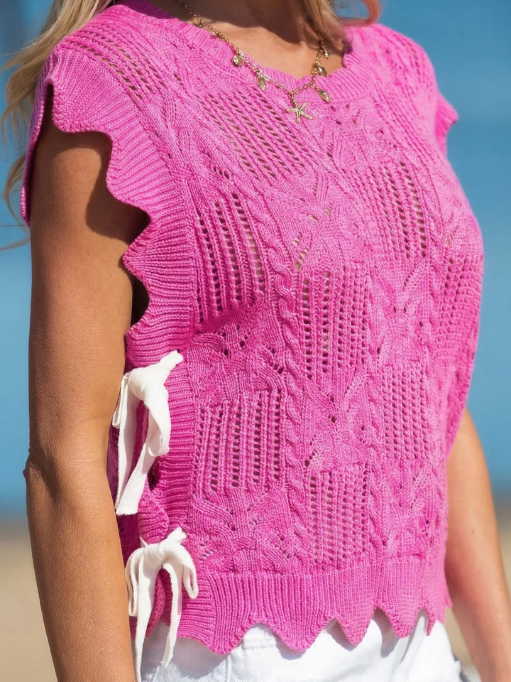 Openwork cable knit crop top with side ties and ruffle sleeves