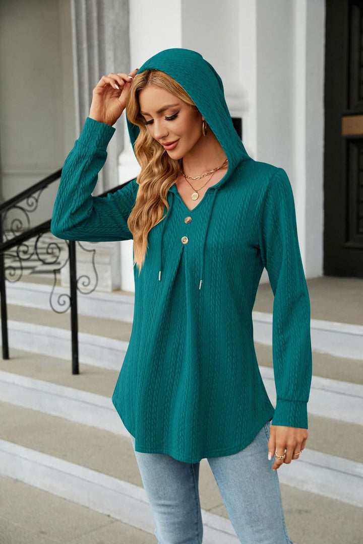 Cable knit hooded top with tie neck and button placket