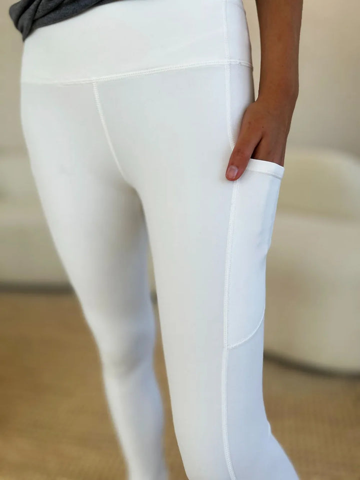 Wide waistband sports leggings with side pockets