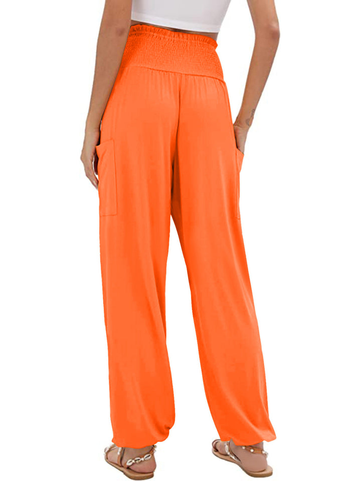 High-rise smocked harem pants with side pockets