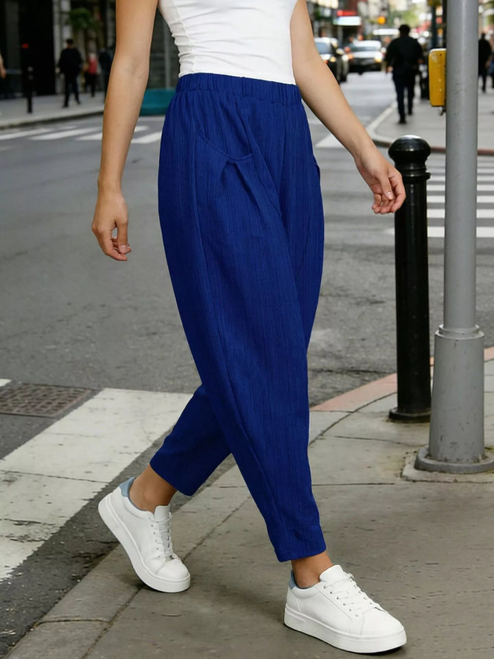 Plus size elastic waist harem pants with side pockets
