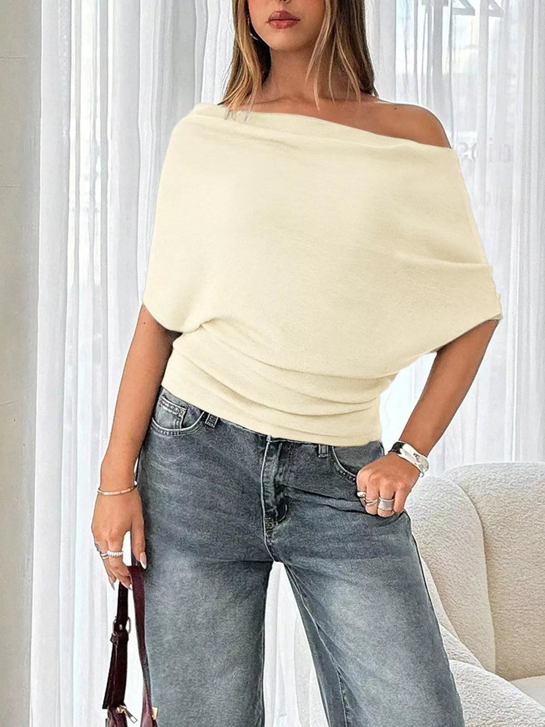 Off-shoulder ruched ribbed knit short-sleeve top