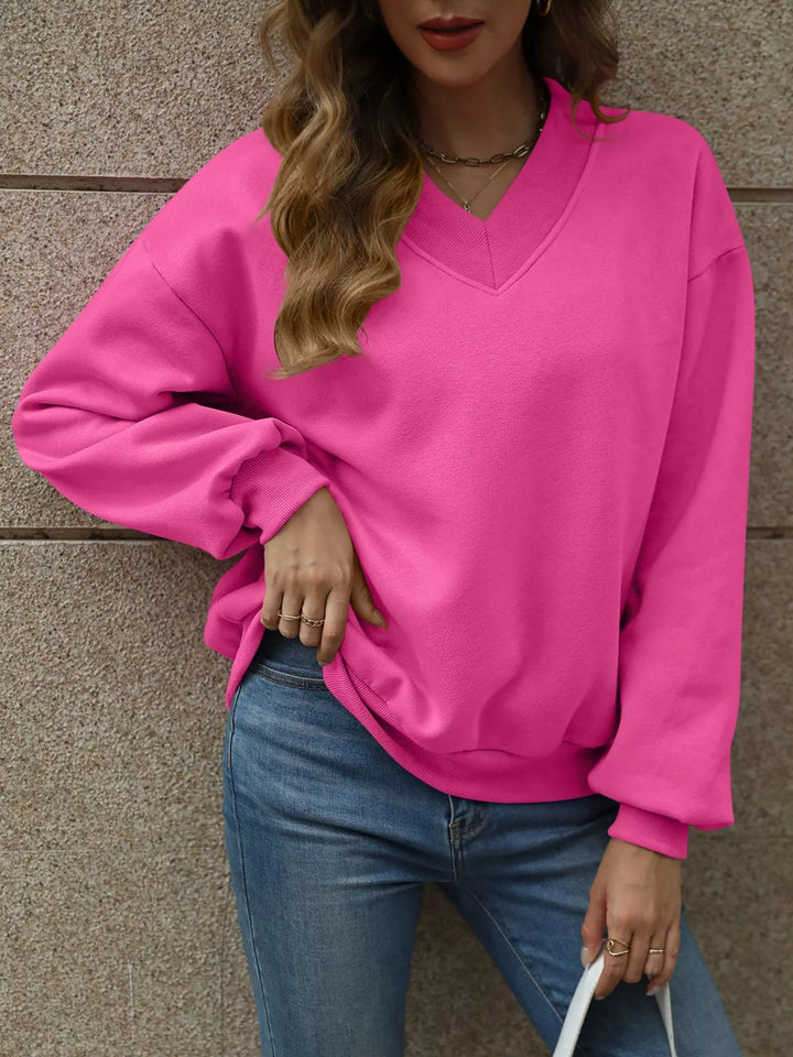 Hot Pink V-neck drop-shoulder pullover sweatshirt with ribbed trim