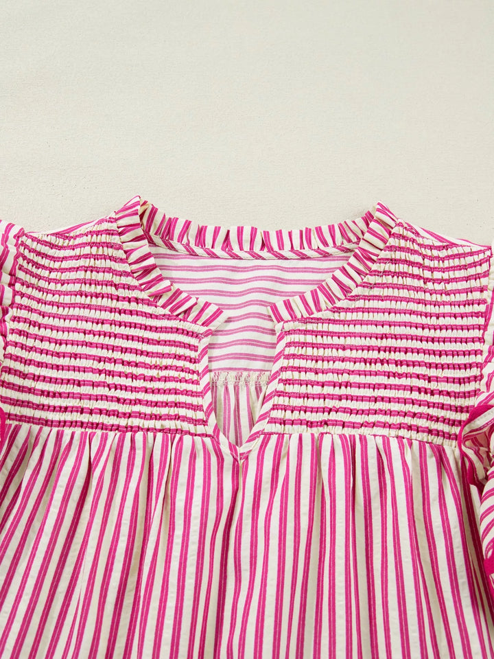 Striped shirred-yoke blouse with ruffled flutter sleeves