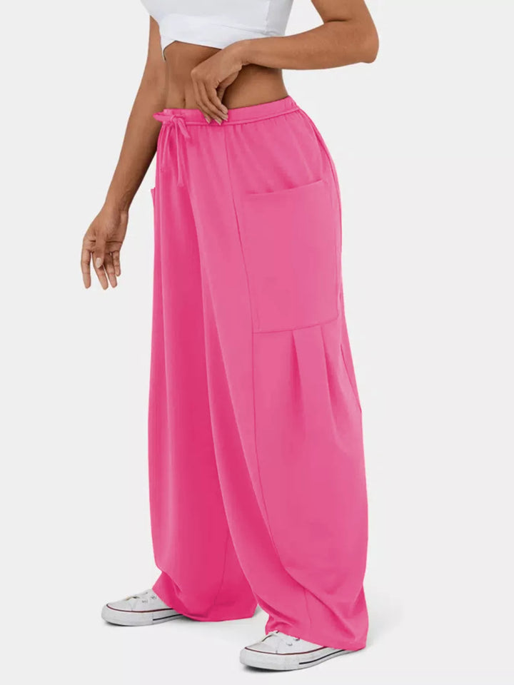 High-rise drawstring wide-leg pants with patch pockets