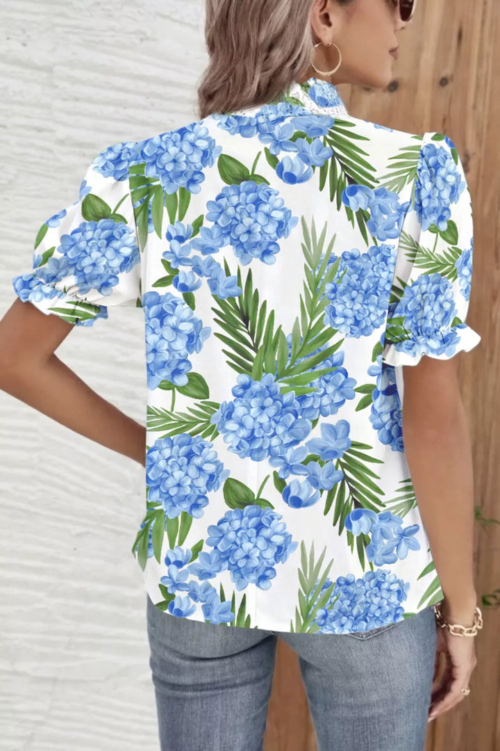 Tropical floral and stripe patchwork blouse with ruffle trim
