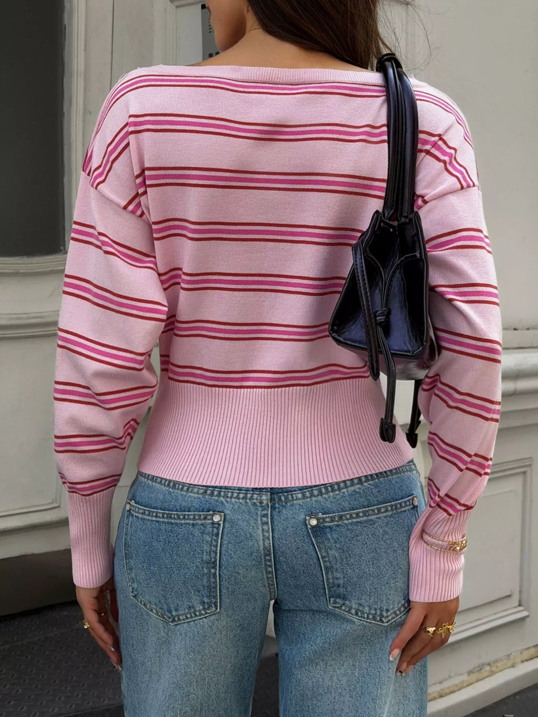Striped off-shoulder knit sweater with ribbed hem