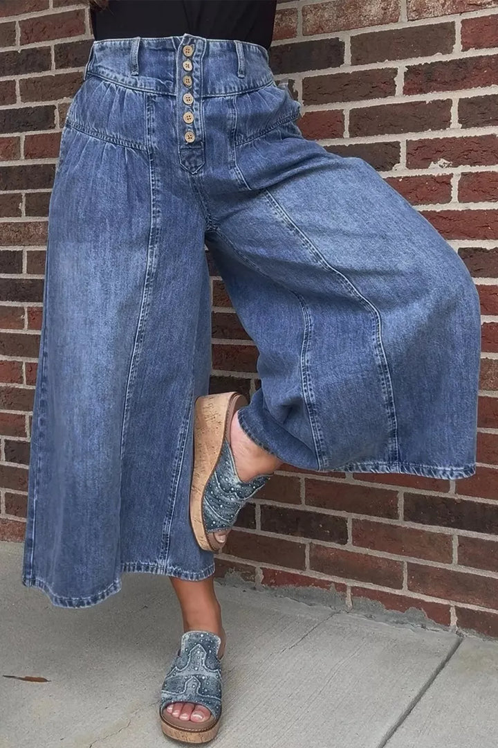 High-rise wide-leg button-fly jeans with pleated waist