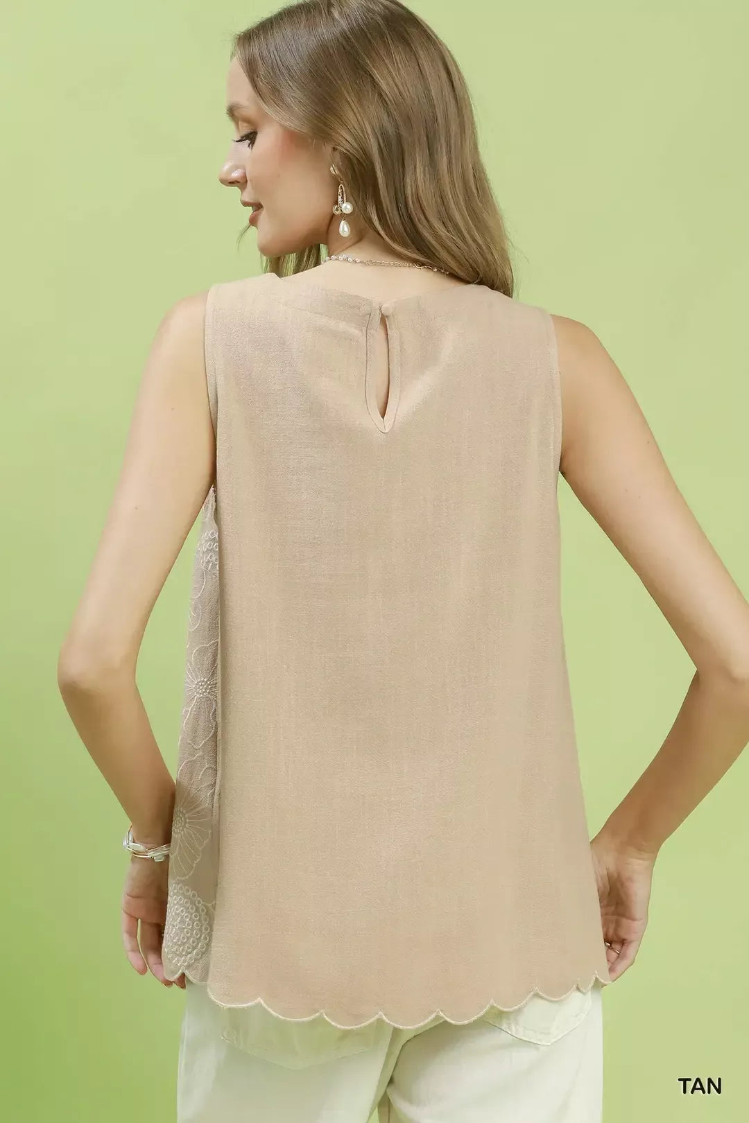 Floral embroidered sleeveless top with scalloped hem