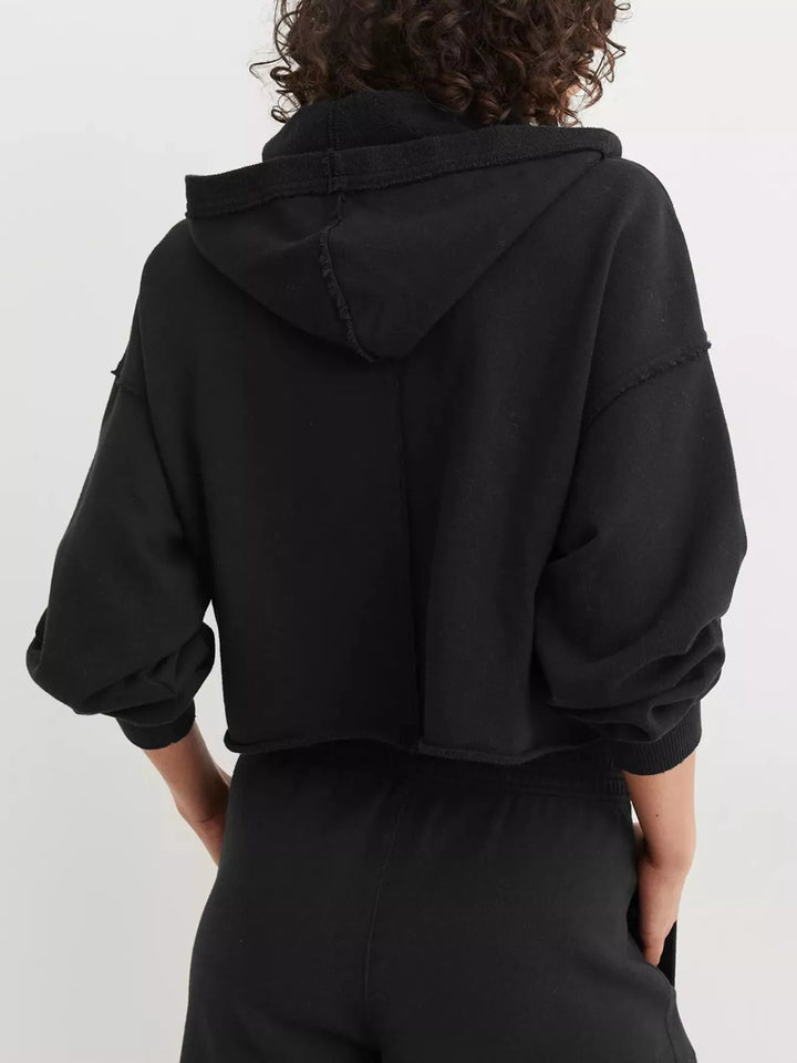 Cropped exposed-seam pullover hoodie with split neck