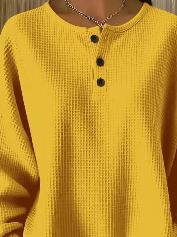 Waffle knit henley top with button placket and long sleeves