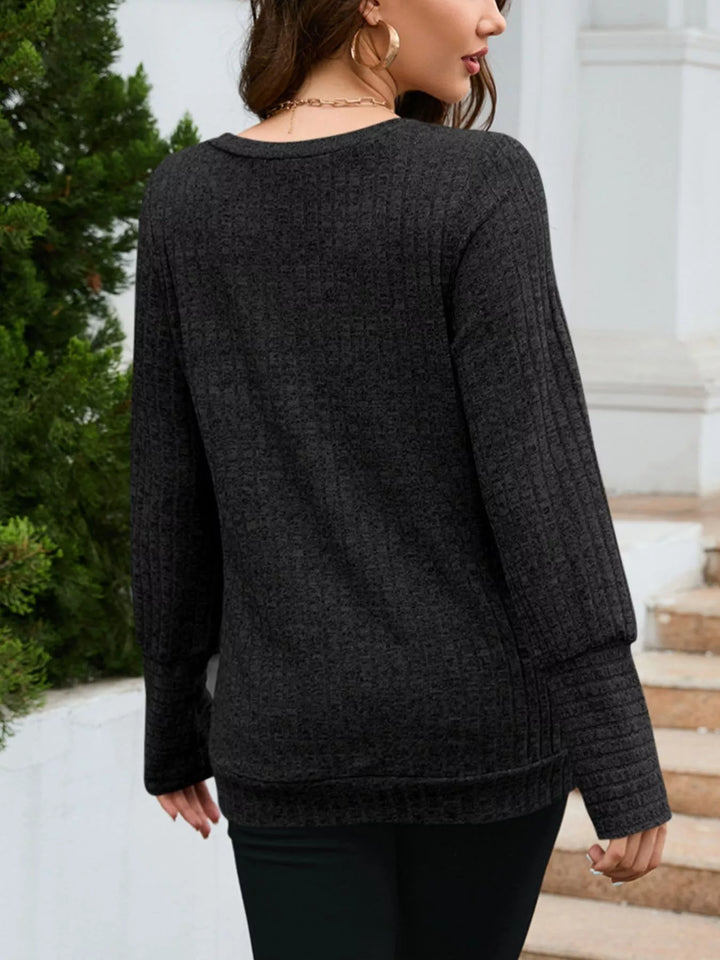 Ribbed knit V-neck long sleeve top with drop shoulders
