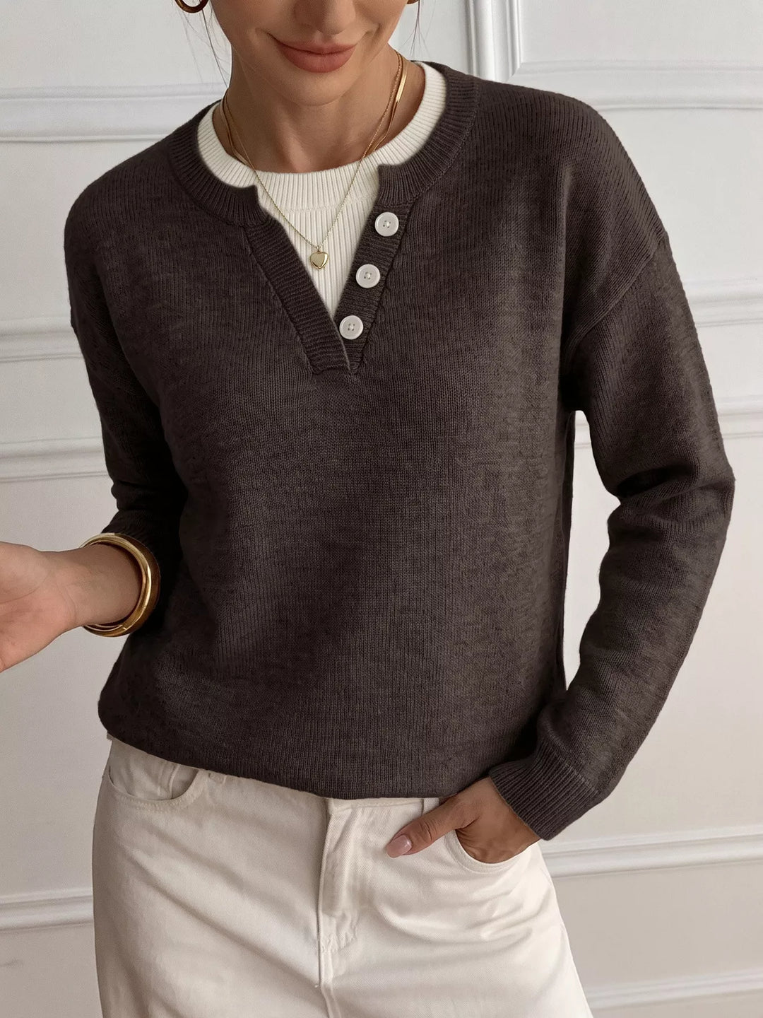 Three-button henley placket knit sweater with ribbed trim