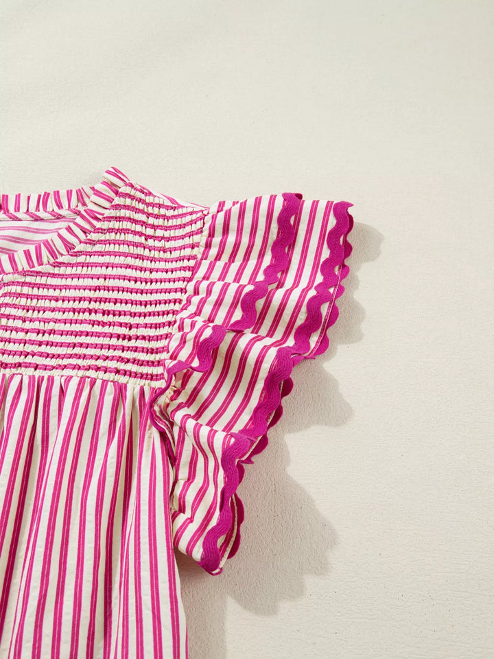 Striped shirred-yoke blouse with ruffled flutter sleeves