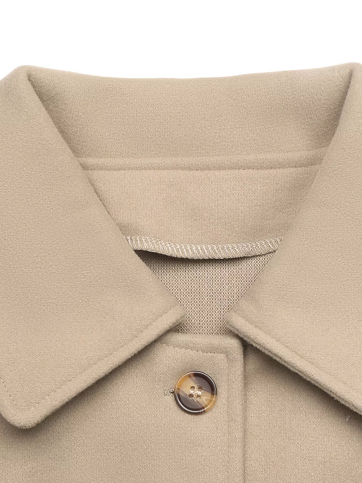 Cropped collared button-up jacket with cuff tabs