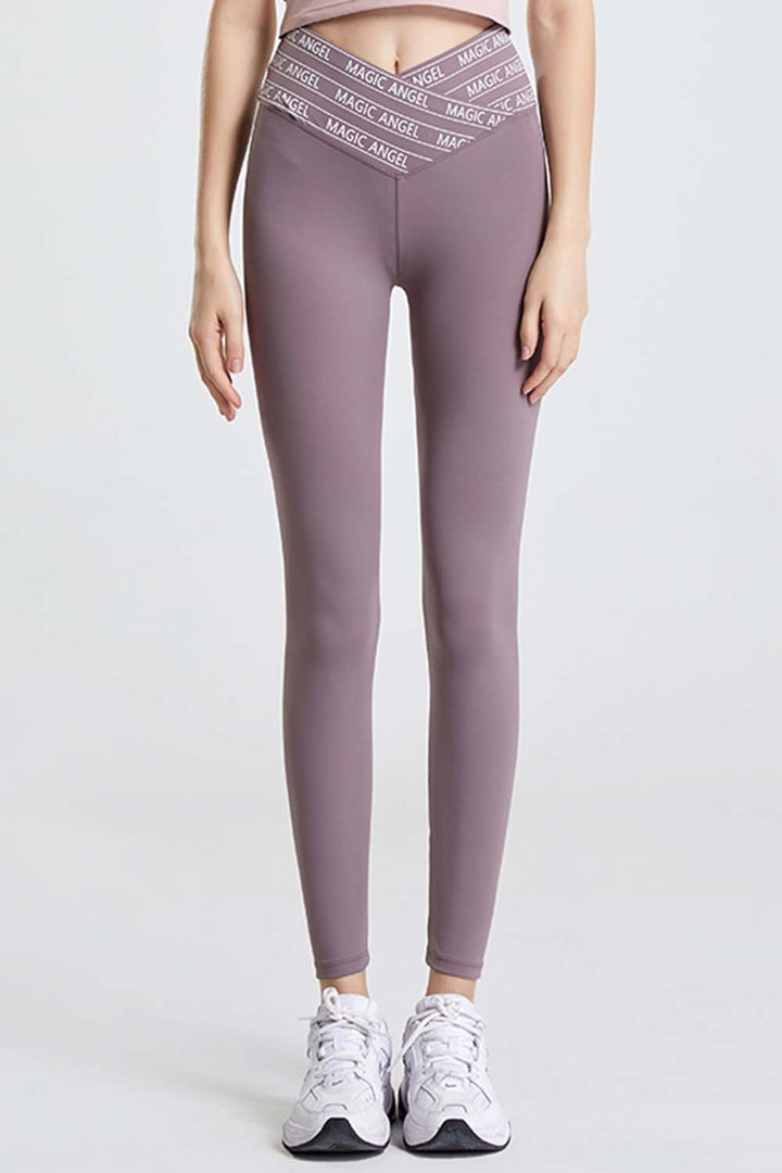 Mauve Slogan tape crossover waist cropped workout leggings