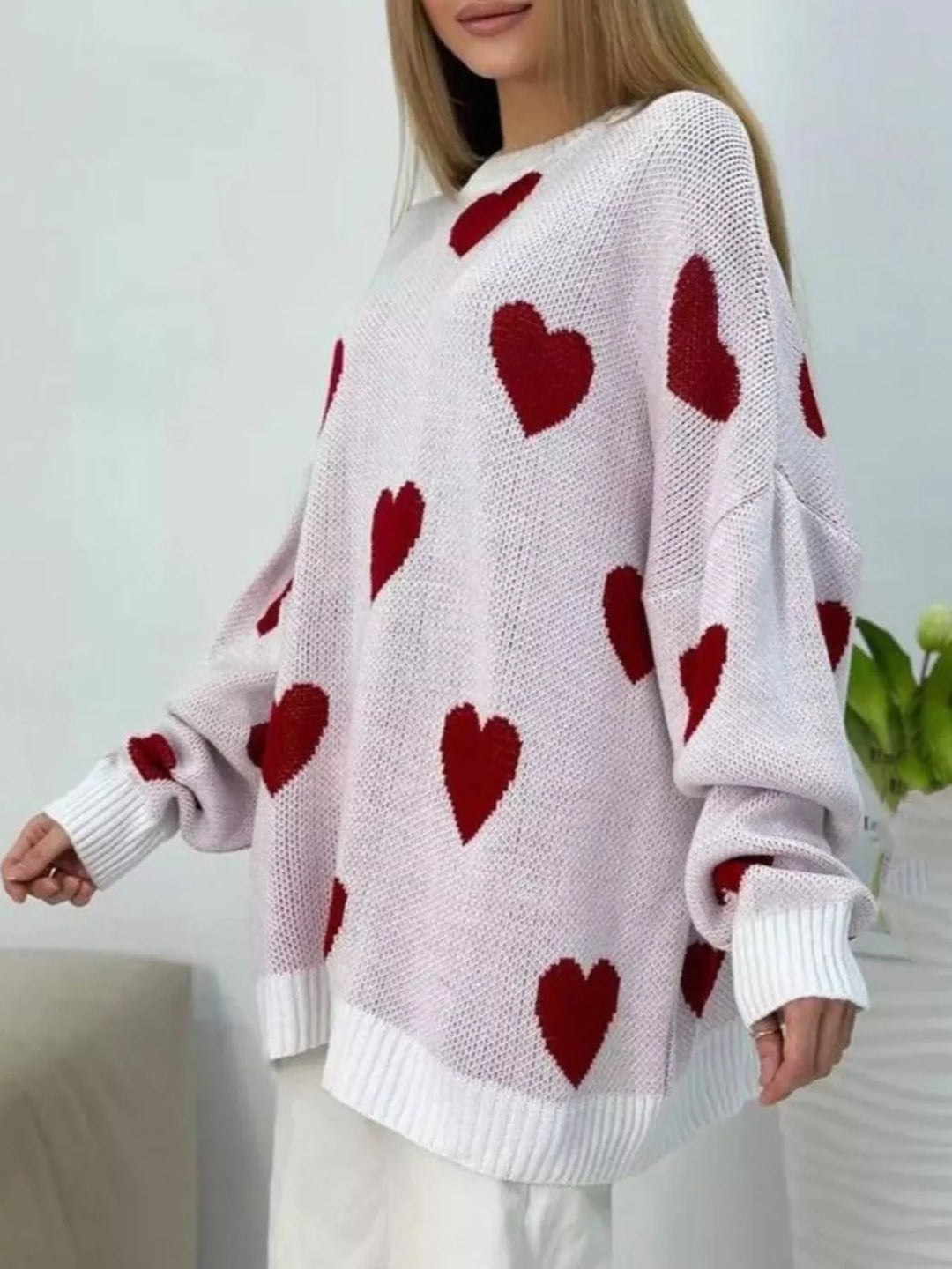 Oversized heart-print knit sweater with drop shoulders