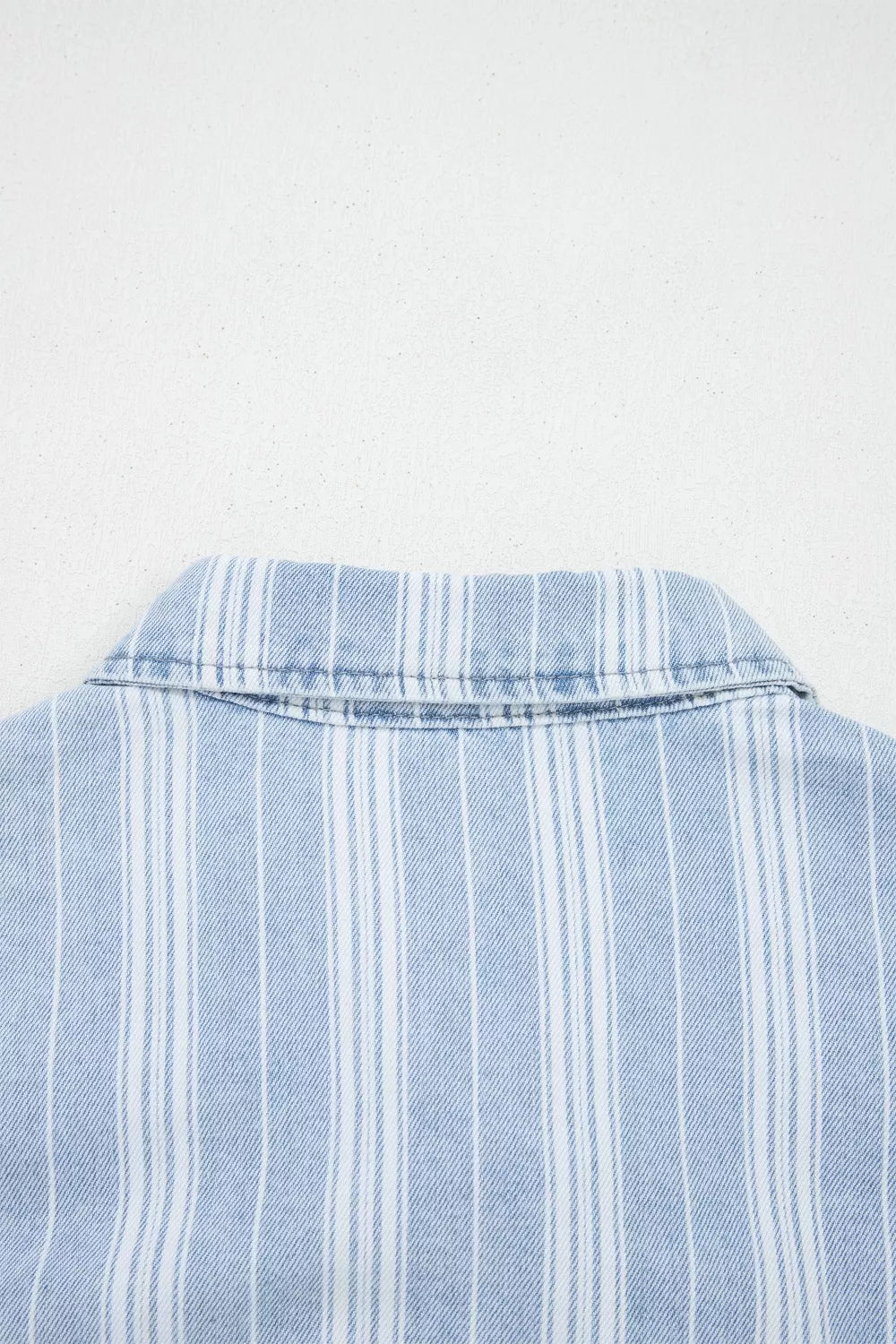 Striped denim shacket with chest pockets and raw hem