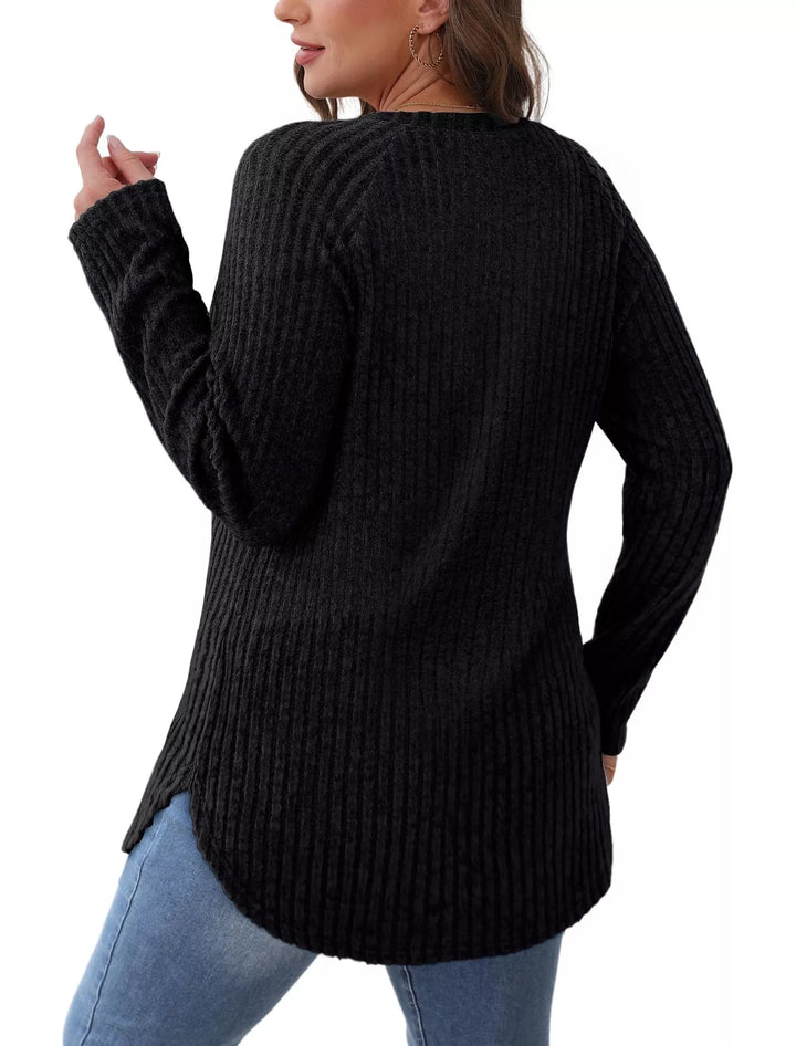 Ribbed knit crew neck long sleeve top with curved hem