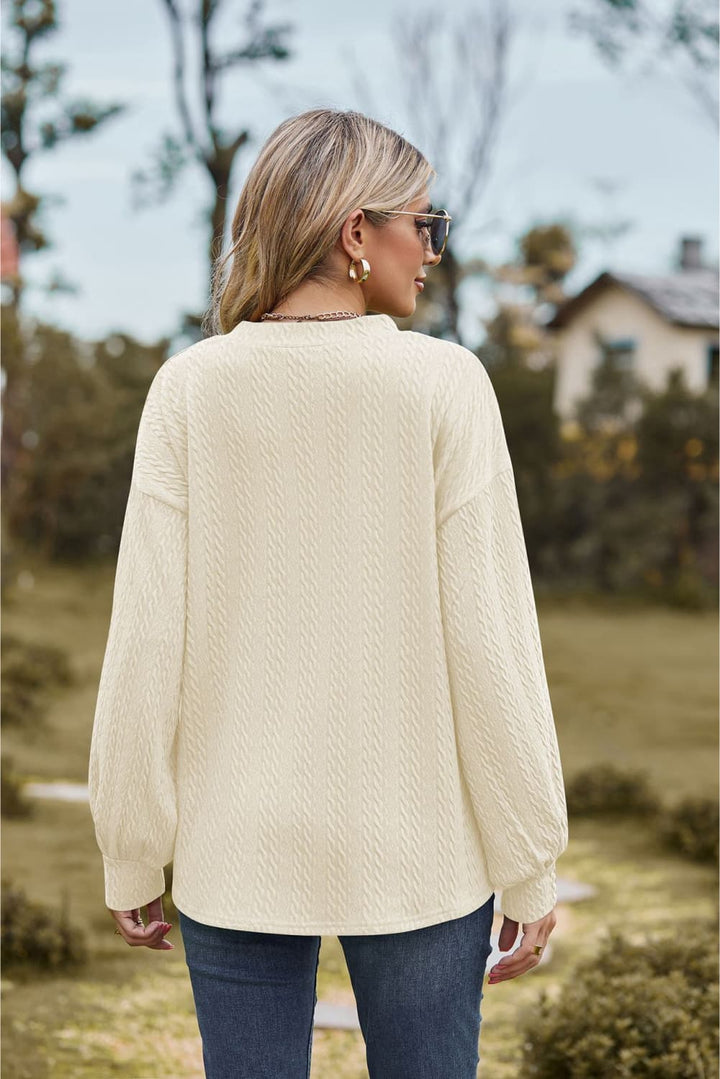 Textured knit V-neck top with dropped shoulders