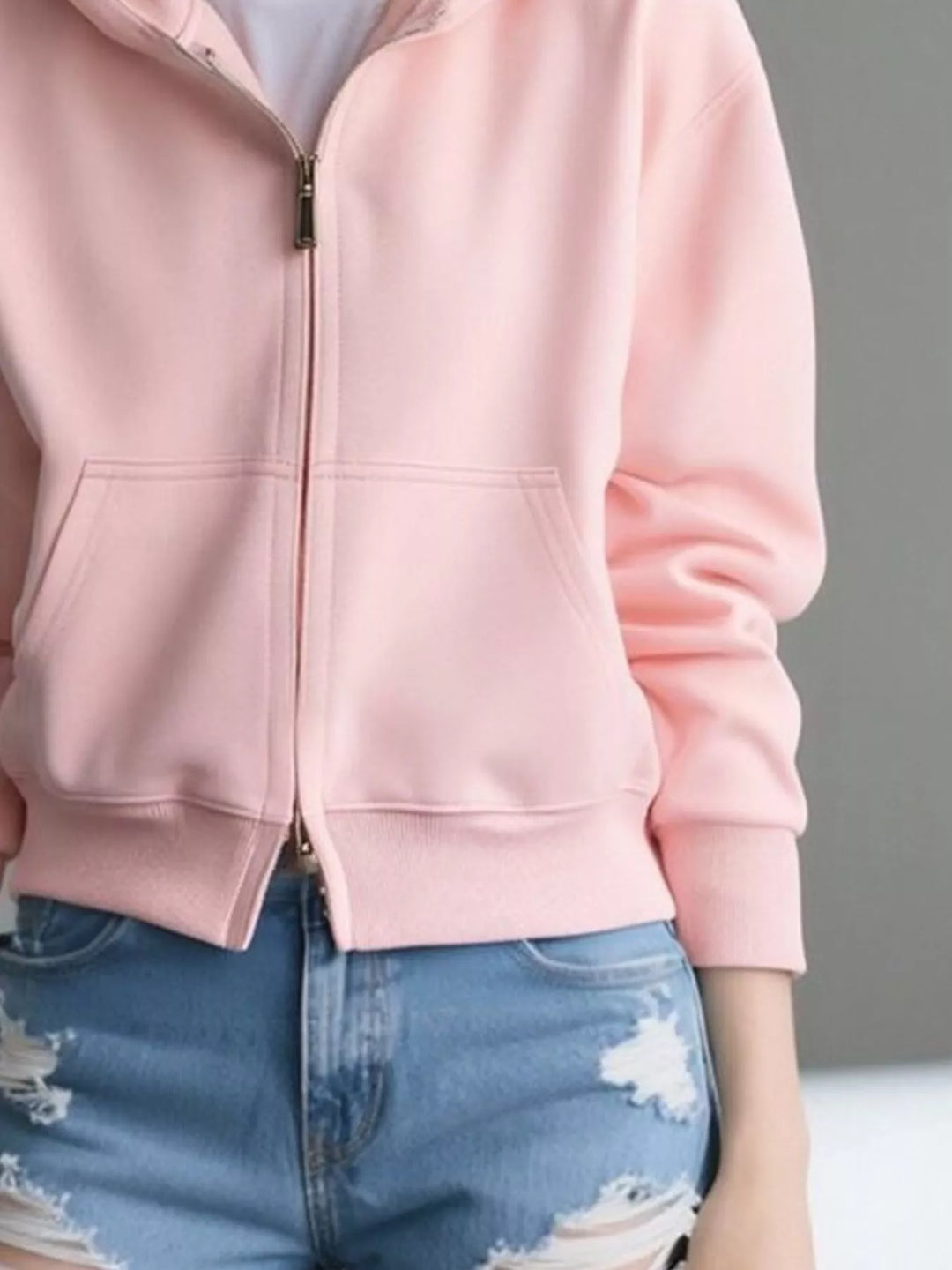 Zip-up hoodie with front pockets and ribbed cuffs