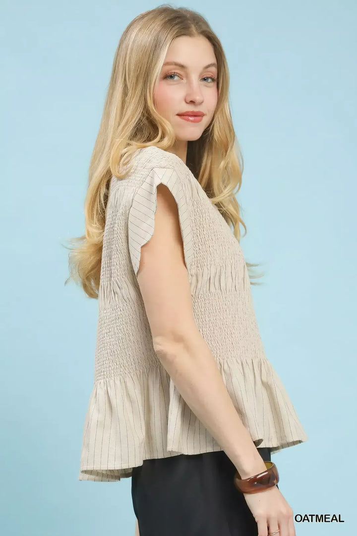Pinstripe smocked peplum top with ruffle cap sleeves