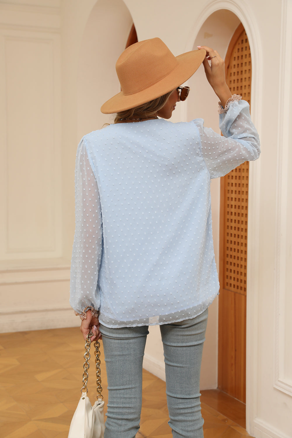 Swiss dot V-neck blouse with crochet lace trim and cuffs