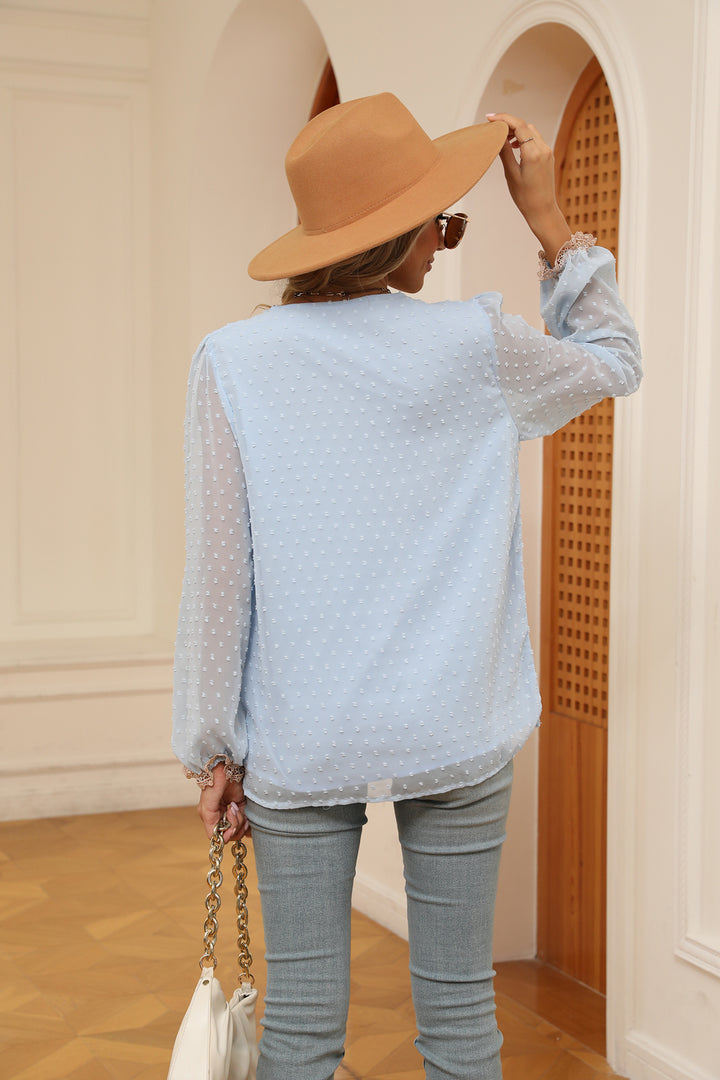 Swiss dot V-neck blouse with crochet lace trim and cuffs