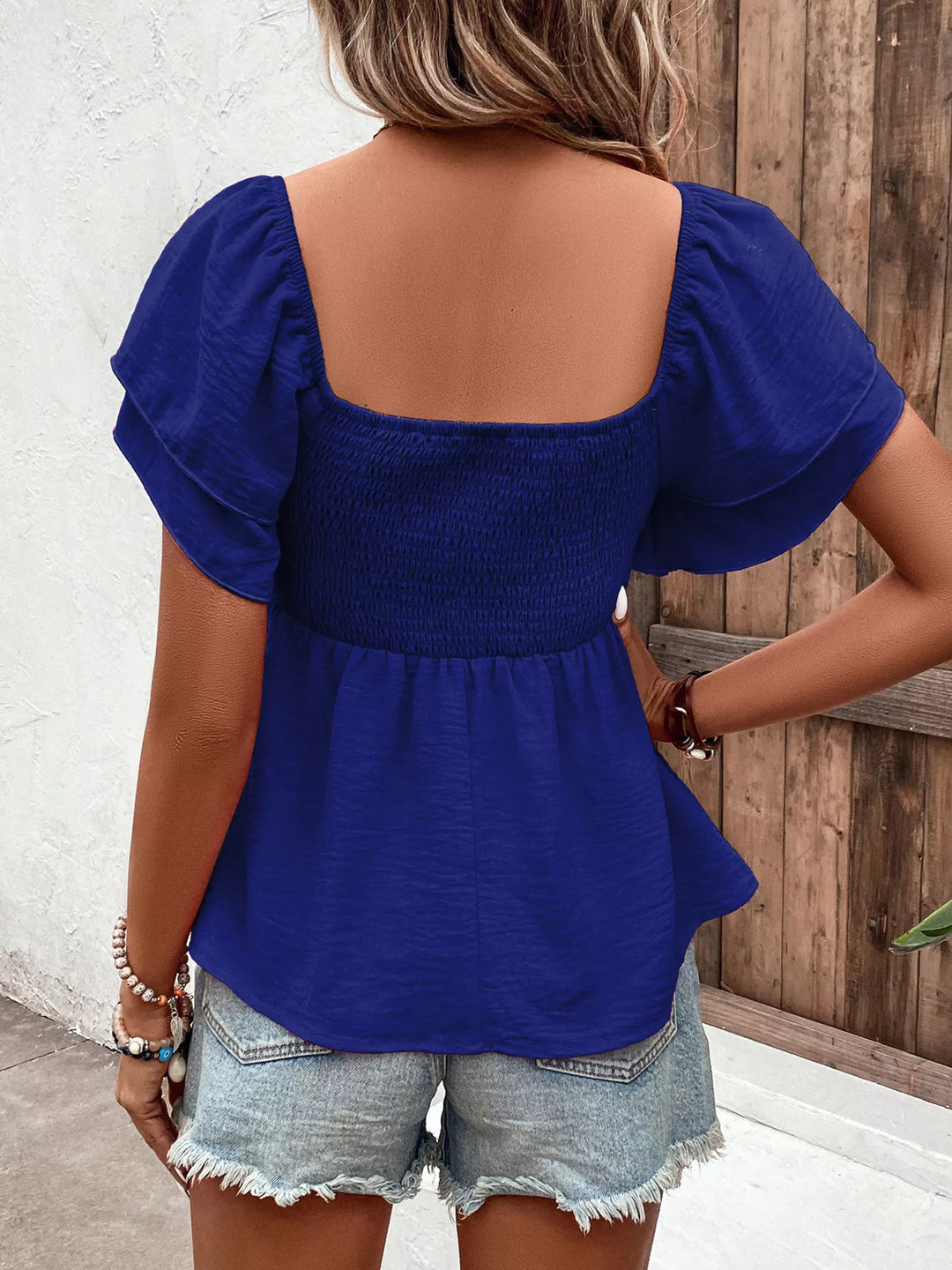 Smocked square neck blouse with ruffle cap sleeves