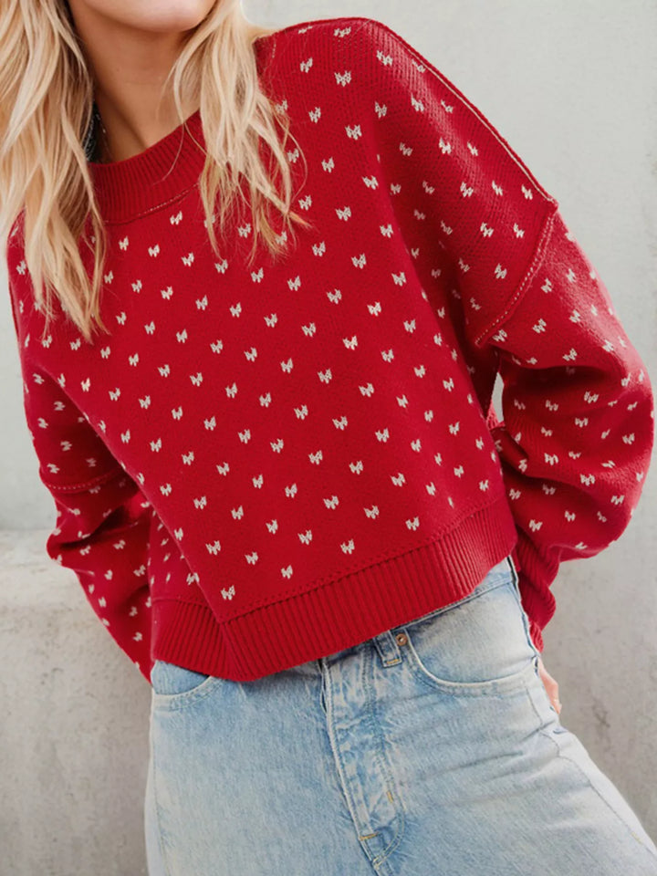 Dropped shoulder knit sweater with ribbed trim and side slits