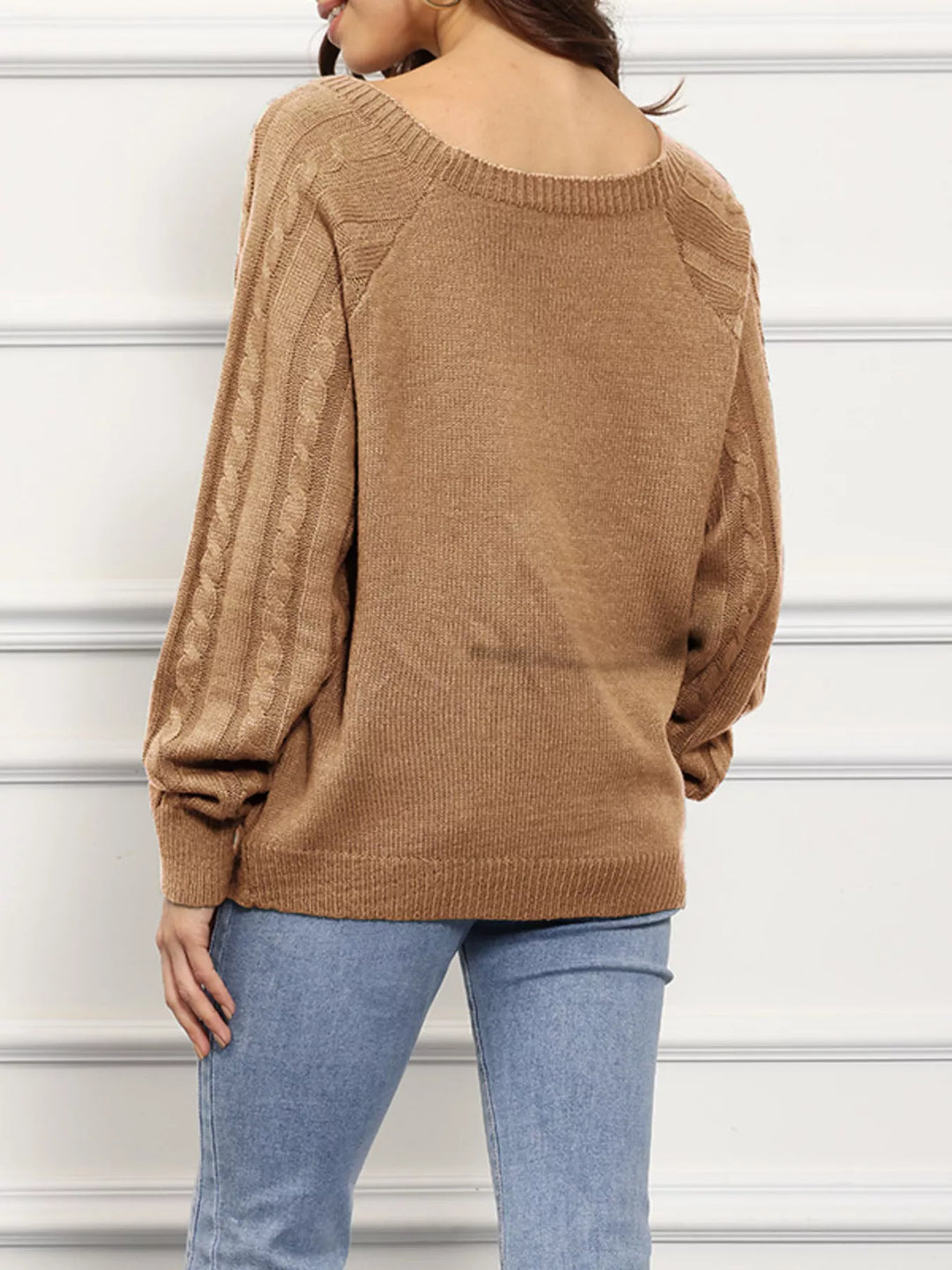 Cable knit boat neck sweater with side button trim