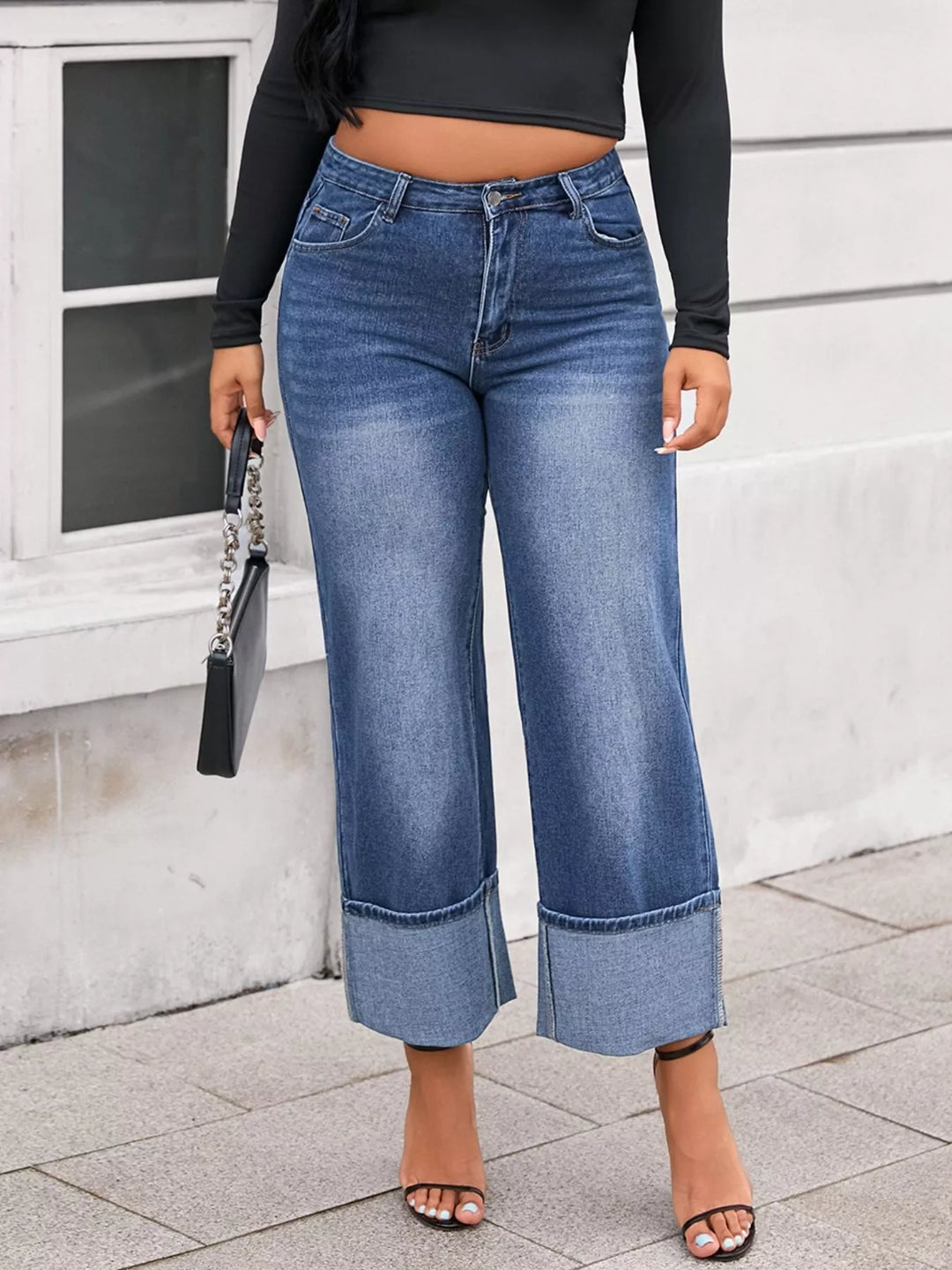Plus size high-rise wide-leg jeans with deep cuffed hem