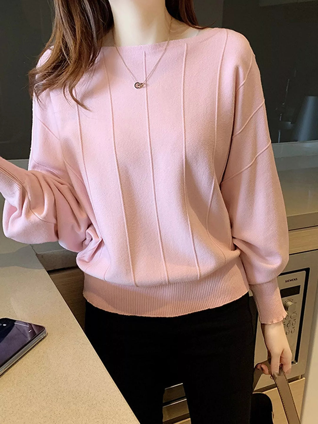 Boat neck batwing sleeve knit pullover with ribbed hem